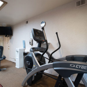Elliptical machine and cycling fitness machines in fitness center at Vista Mirage Resort