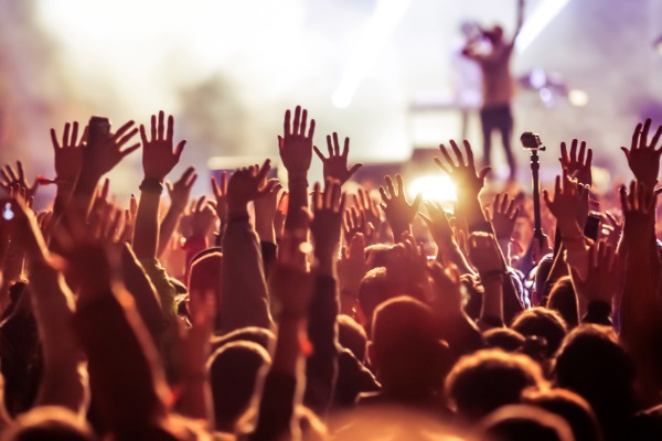 festival season in indio near vista mirage resort crowd with their hands in the air